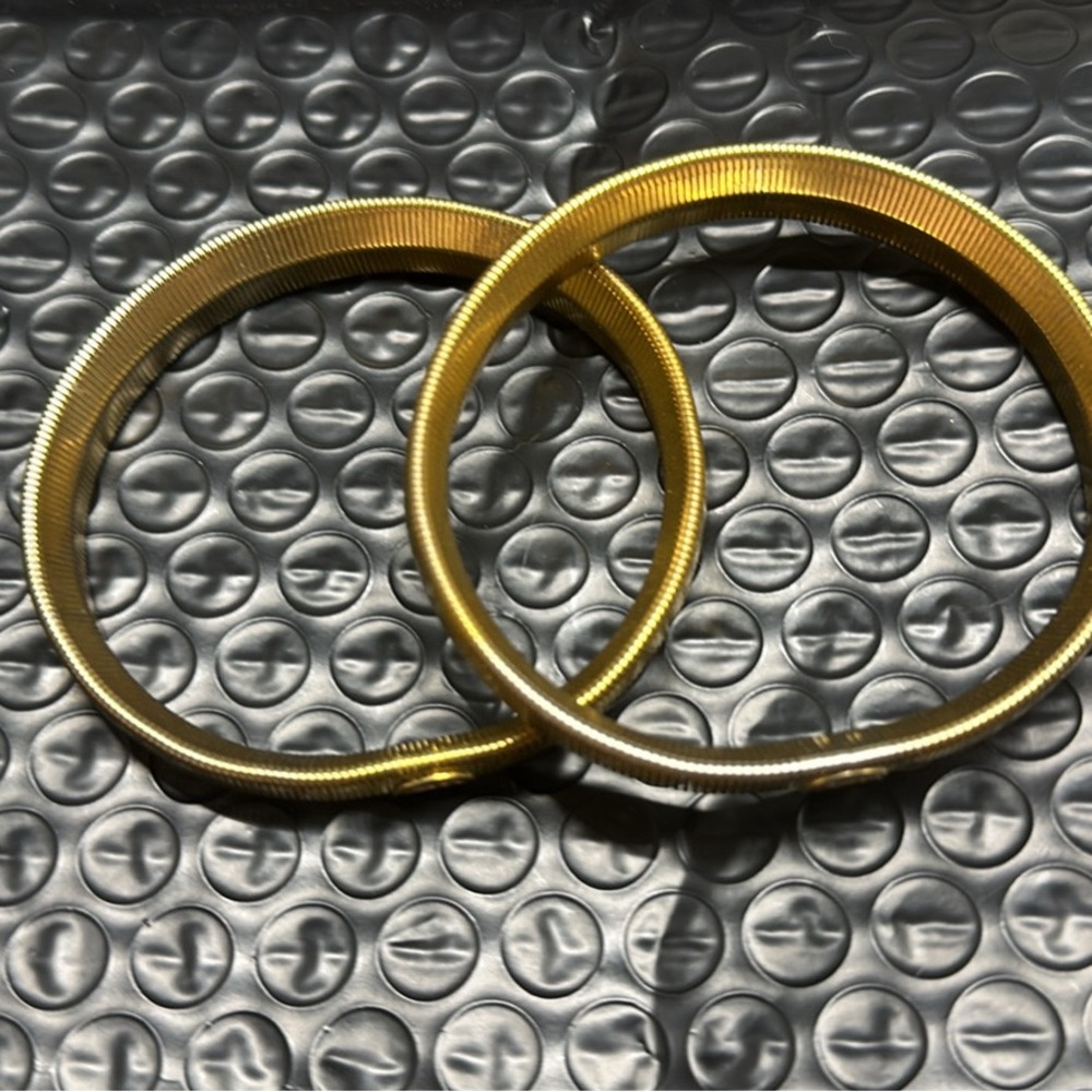 Vintage Gold Tone Spring Bracelet with Bear Emblem